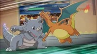 PO03 Ataque furia.png (1,36 MB) Rhydon de Giovanni usando ataque furia contra el Charizard de Rojo.