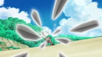Rockruff de Ash usando lanzarrocas.