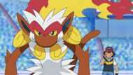 Infernape junto a Ash.