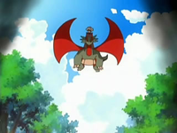 Salamence de J usando vuelo como medio de transporte para su entrenadora.