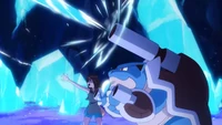 Mega-Blastoise usando hidrocañón contra el Mewtwo de Elaine