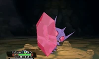 Mega-Sableye en combate.