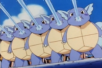 Wartortle usando pistola agua.