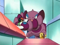 Drapion usando fuerza. Sujeta a Ash fuertemente...