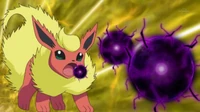 Flareon de Úrsula usando bola sombra.