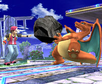 Charizard usando golpe roca en Super Smash Bros. Brawl.