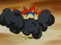 Cyndaquil de Ash usando pantalla de humo.