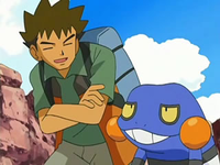 Brock junto a Croagunk.