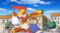 Infernape de Allegra usando ultrapuño contra el Croagunk de Brock en la P10.