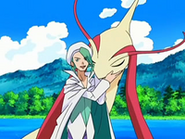 Plubio/Wallace acariciando a su Milotic.