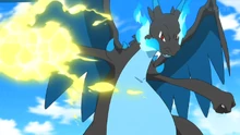 Mega-Charizard X usando puño trueno.