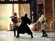 Obi-Wan y Qui-Gon pelean con Darth Maul.