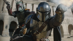 Djarin y Fett, en un esfuerzo conjunto, intentan defender Mos Espa de los atacantes pykes.