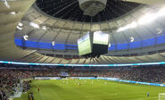 El estadio en un partido de futbol.