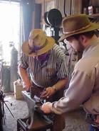 Devin with Jim White, the blacksmith
