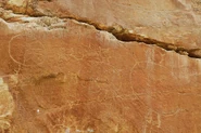 Petroglyphs on the rock wall