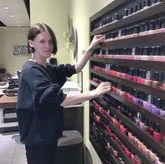 Picture of Anhedönia working as a Nail Technician.