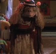 E.T. dressed as a girl
