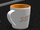 Daf items daf xf white orange mug.png