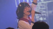 Akico Niwa cosplating Kijin Seija during the 東方LIVEBOX live event.[3]