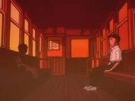 Shinji en el tren.jpg