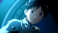 Shinji sonriendo a Rei (Rebuild 1