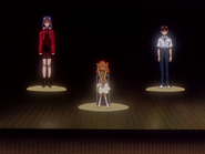 Shinji's and Misato's image surround Asuka
