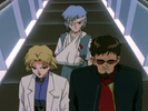 Ritsuko et Gendo, accompagné de Rei