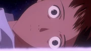 Shinji when he gets a glimpse of Rei, and notices Asuka by his side. He is clearly surprised and disturbed, very different from his more calm look when emerging from Instrumentality.