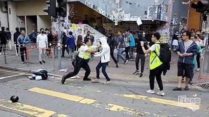 西灣河交警開槍一男子倒地