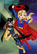 Happy Halloween! Fay and Destiny Claus are dressed up as Batgirl and Supergirl!