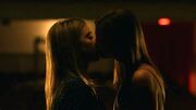 Kate and Emaline kiss