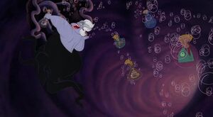 Ursula throws potions off her cupboard.