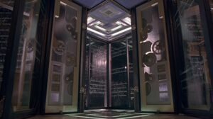 An intricate set of sliding glass doors inside the Glass House are etched with Barrier Spells.