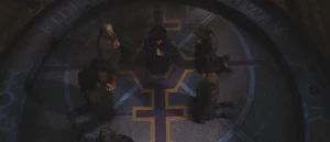 The Brethren pray within the sanctity of their Church in an attempt to chase away the Otherworld.