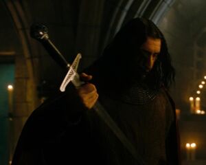 Maxim Horvath sheathing his Sword.