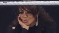 Layla smiling evilly after AJ's victory