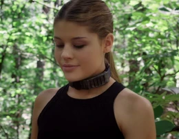 Joy smiles after she crushes a small animal under her feet.