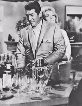 Barbara gives Matt a reach around trying to get him to join with her.