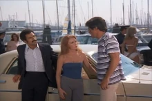 The goodies triumphant - the looser led to jail in the background, arms cuffed behind...