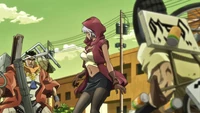 … but she is trapped between the heaps of metal hurling towards her from both sides