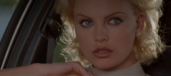 Charlize Theron slips into white lingerie in 1996 film 2 Days in the Valley
