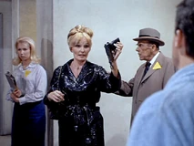 After shooting her boss to save her own skin, Inga surrenders to Solo.