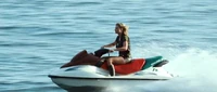 The evil Magda's first appearance, riding her jet ski