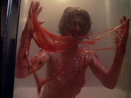 She is in fact shrieking and melting alive.