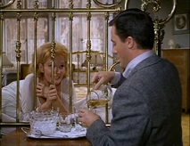 Inga kicks off her shoes and gets comfortable on Solo's bed.