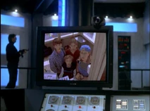 The child heroes appear on Medusa's screen. They tell her, "We're not afraid of you!"