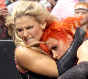 Natalya as a maniacal villainess attacking Becky Lynch