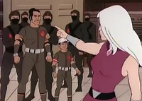 She orders her men to lock the heroes up