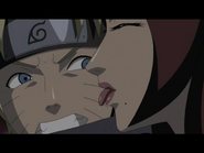Fūka surprises Naruto with a lick on the cheek to taste his chakra.